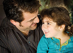 Photo of a father and daughter. Links to Gifts of Appreciated Securities