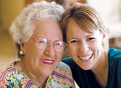 Photo of two women smiling. Links to Gifts of Cash, Checks, and Credit Cards